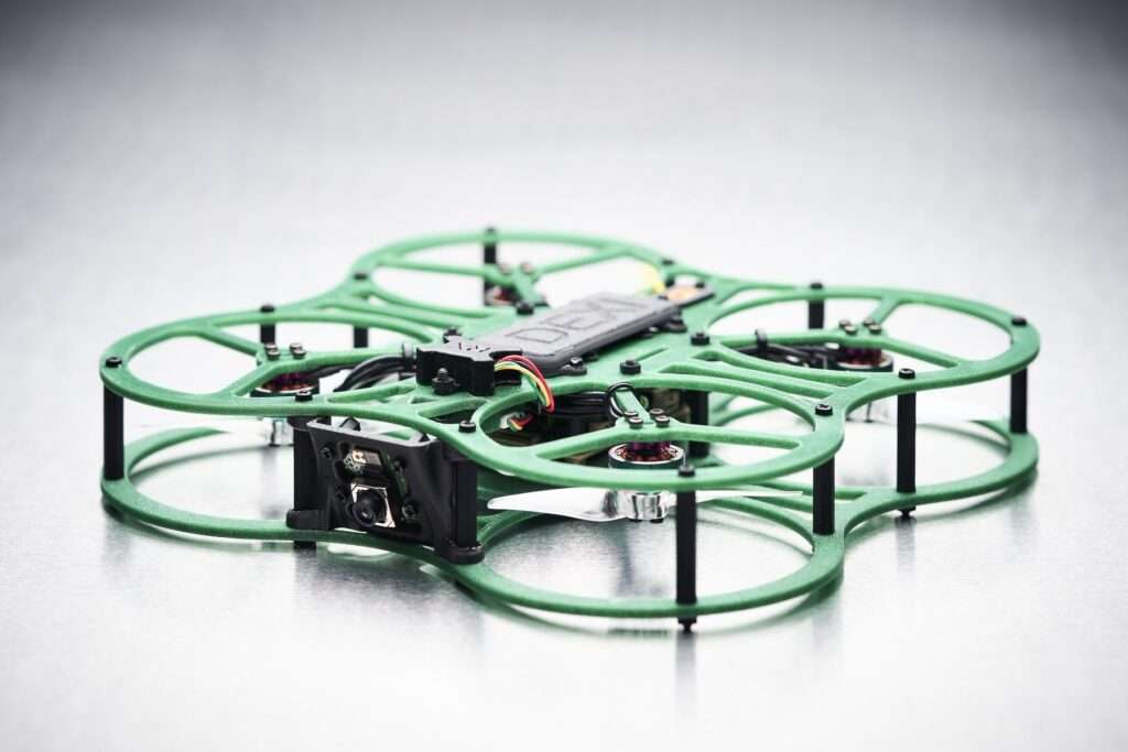 DEXI 3 assembled, three-quarter view on a studio sweep